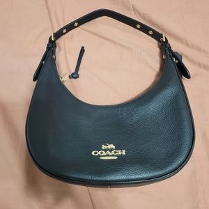 Black pebble coach shoulder bag